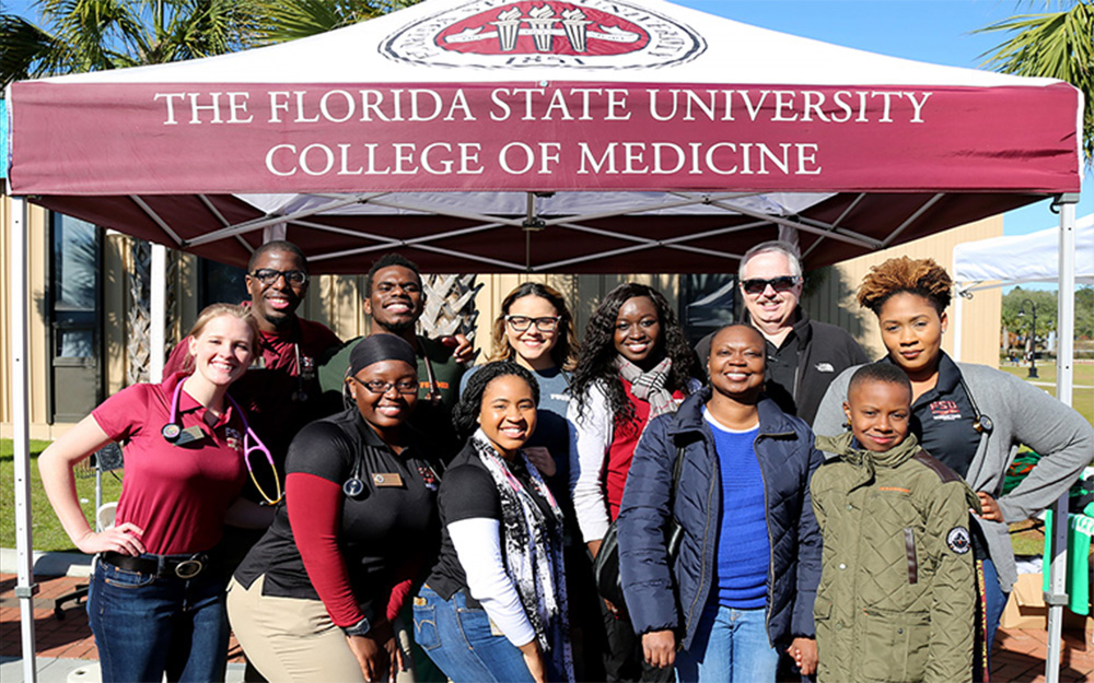 Medical Students Helping Others Thru Service